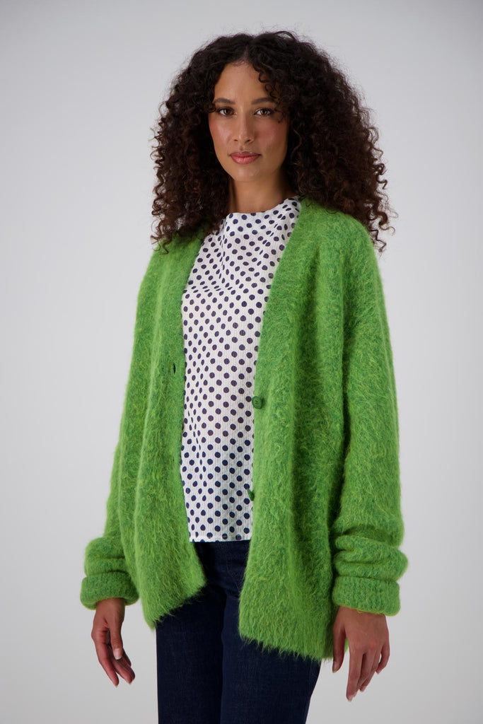 Olga de Polga bright green alpaca To The Moon & Back long cardigan coat, with extra long sleeves. Side front