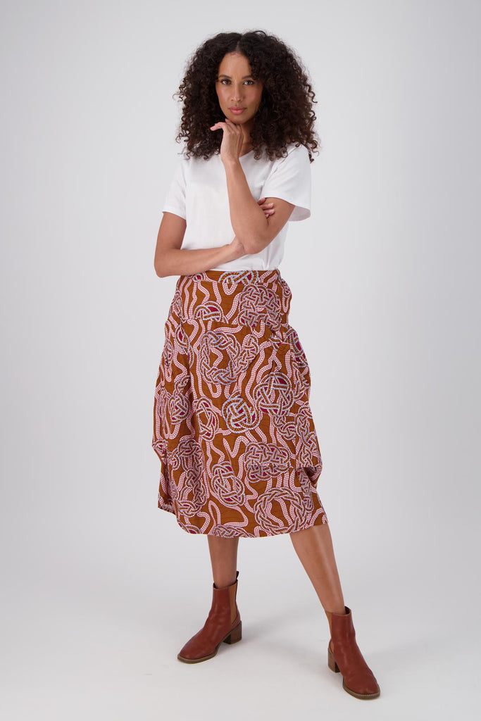 Olga de Polga printed Milwaukee skirt in fine cotton corduroy. Slouchy skirt with a unique shape anf large pockets. The skirt has an elasticated back waistband for extra comfort. Front full length view