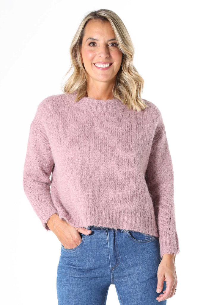 Olga de Polga Marshmallow Alpaca Sweater Musk Pink. A beautifully textured relaxed fit knit, slightly cropped length, with a drop sleeve and round neck. Perfect with mid and high-waisted jeans and skirts.