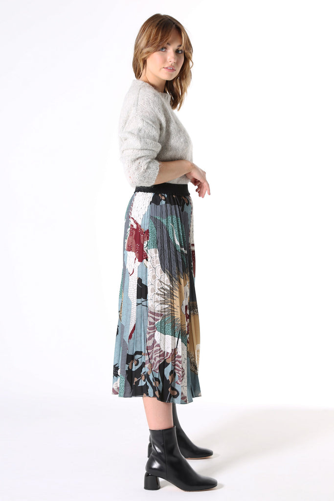 Olga de Polga pleated skirt in Green Festival printed recycled polyester. side view