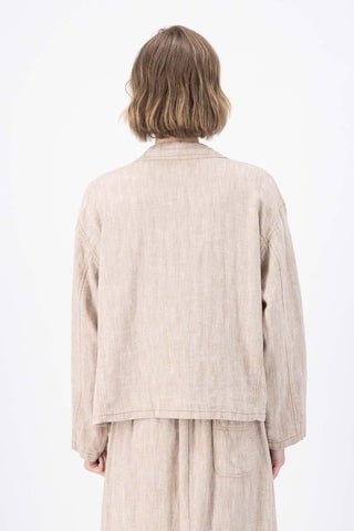 Olga de Polga Billie jacket in herringbone linen. Colour Beige. Back view on model.