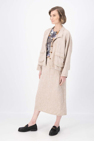 Olga de Polga Billie jacket in herringbone linen. Colour Beige. Side view on model.