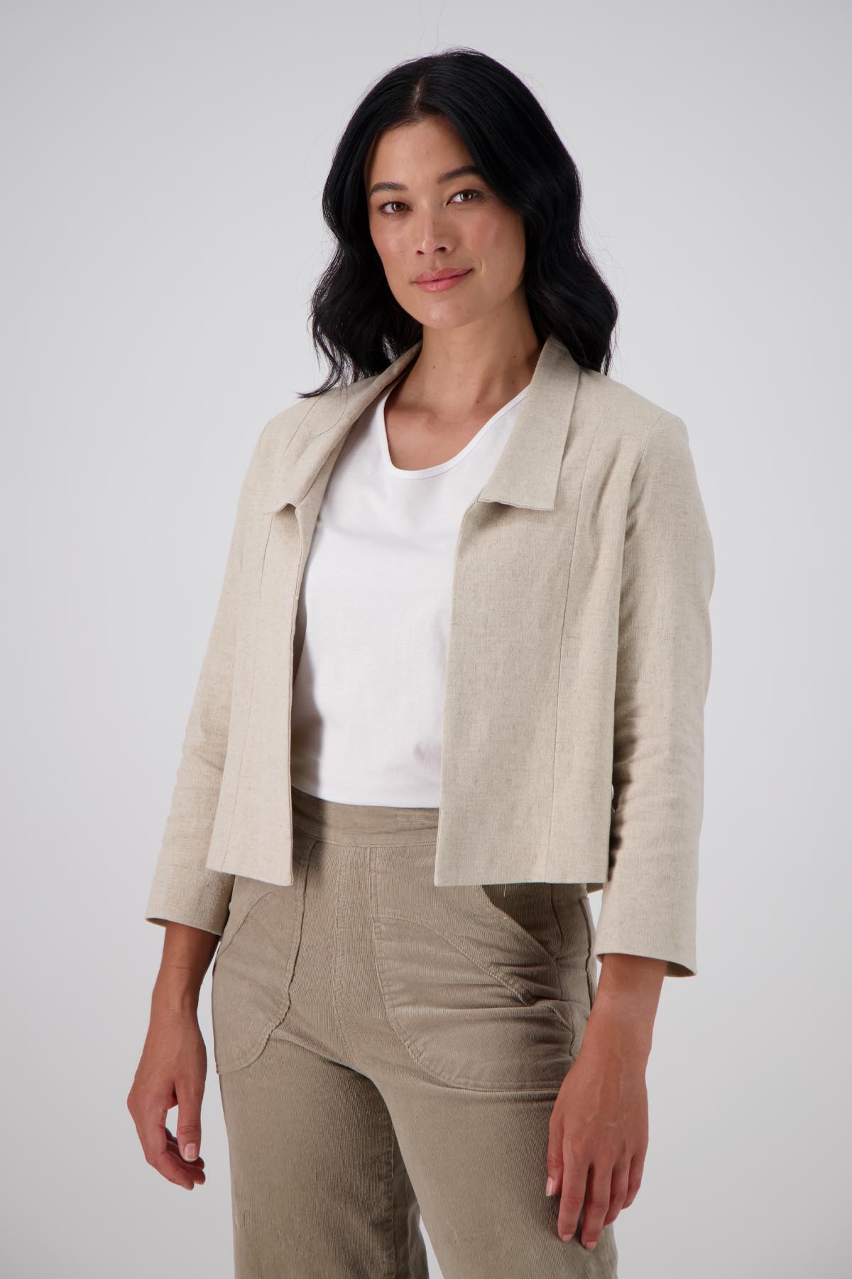 Olga de Polga Esprit Blazer in Oat linen. Cropped sleeves and collar with no button fastening. Front view