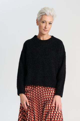 Olga de Polga Black aspen knit sweater 
Ribbing at neckline, wrists and hem. A beautifully textured knit sweater—your perfect winter essential for effortless, trans-seasonal styling.