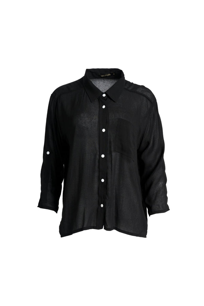 Olga de Polga Ava blouse in Black soft viscose crepe. Front button opening, shirt collar, adjustable sleeve length. Front patch pocket. Front view