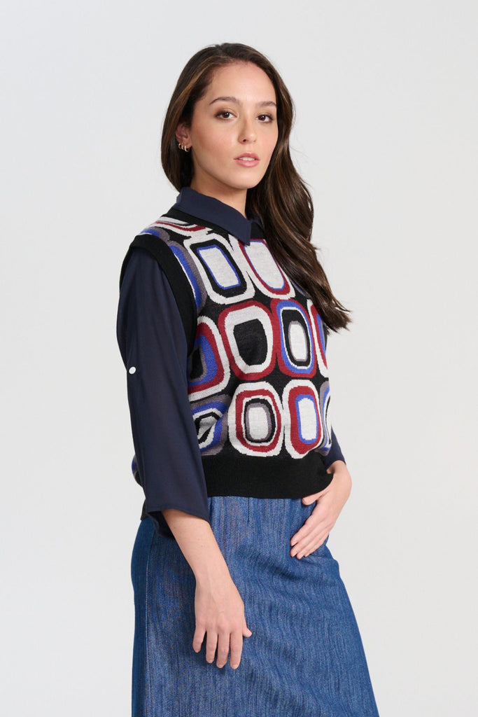 Olga de Polga Black Knitted vest - the Cool Bristol Knit Vest. Side view on model.