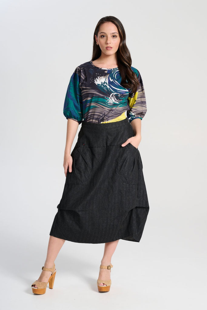 Olga de Polga Harper skirt Milwaukee in black wash. Front view on model.