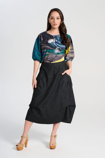 Olga de Polga Harper skirt Milwaukee in black wash. Front view on model.