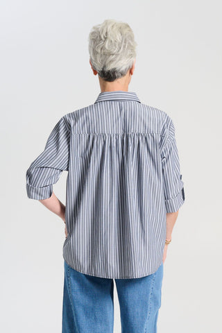 Olga de Polga striped Indra shirt in Licorice. The signature Olga Shirt is great for all occasions. It has an effortlessly chic, relaxed silhouette that drapes with ease. Leave it loose or tuck it in - the choice is yours. Back view on model