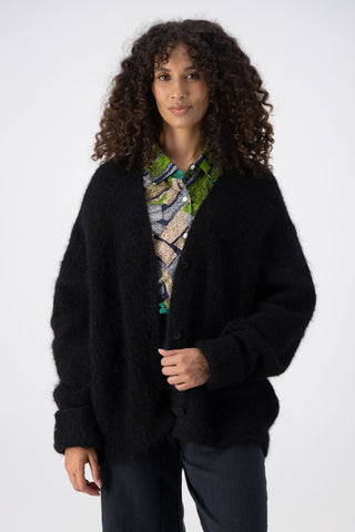 Olga de Polga Black To The Moon & Back alpaca long cardigan coat with extra long sleeves. Front close up view