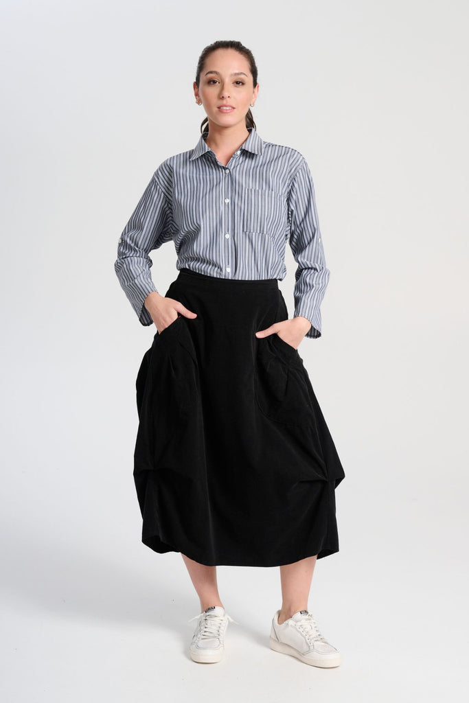 Olga de Polga Black Milwaukee Marlow skirt in fine cotton cord. Comfy waistband making it the perfect throw-on-and-go! Front full view