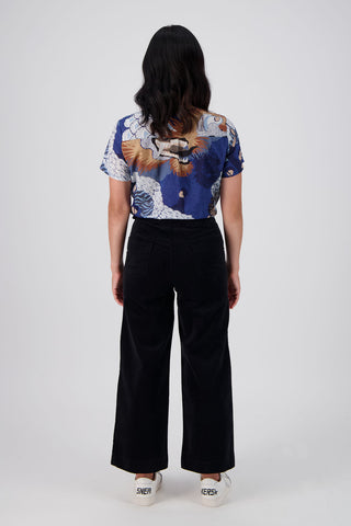 Olga de Polga's bet selling Peggy Pants in Black fine cotton cord. Back view on model