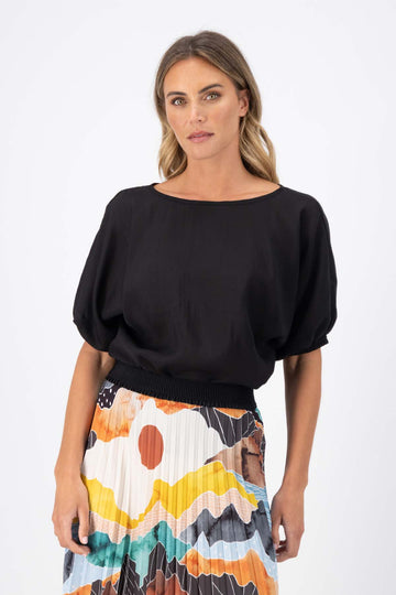 Olga de Polga Camisa Top in Skyscraper black Tencel. 100% Tencel. 
Reversible top with a boat neck and soft v-neck choice. Front close new with boatneck on model.