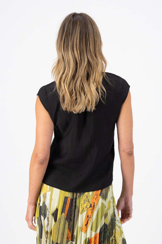 Olga de Polga Black Skyscraper tee in 100% Tencel. Round neck and cap sleeves. Back view on model.