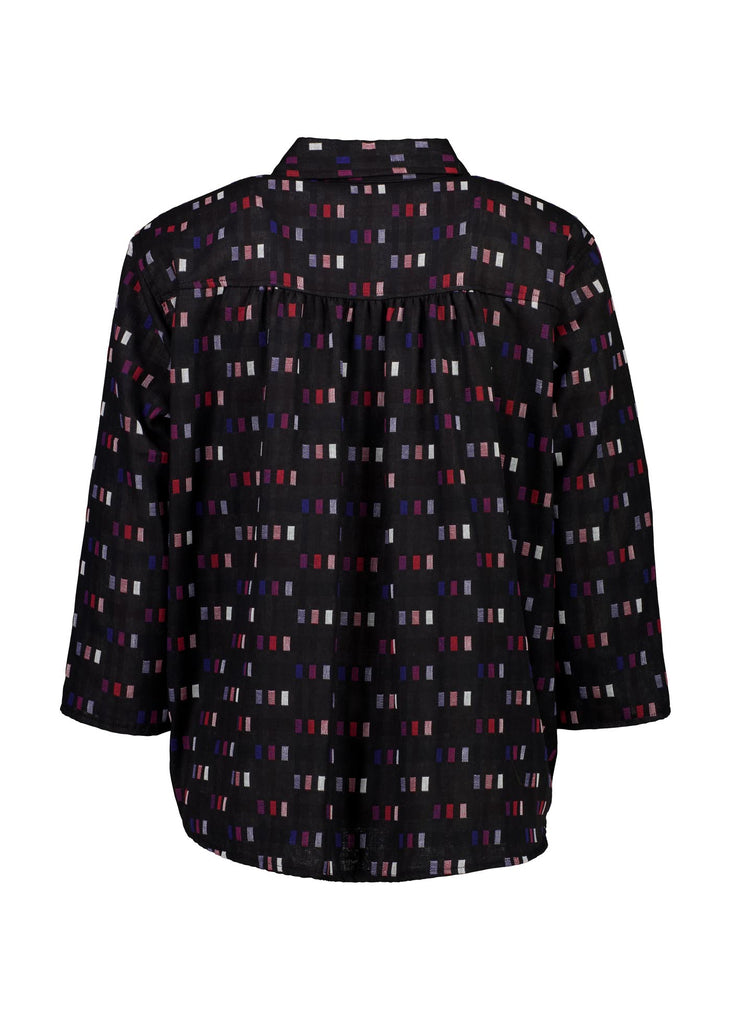 Olga de Polga Black Telegraph blouse in woven cotton with a collar and button up front. 3/4 sleeves and a trapeze shape.  Back