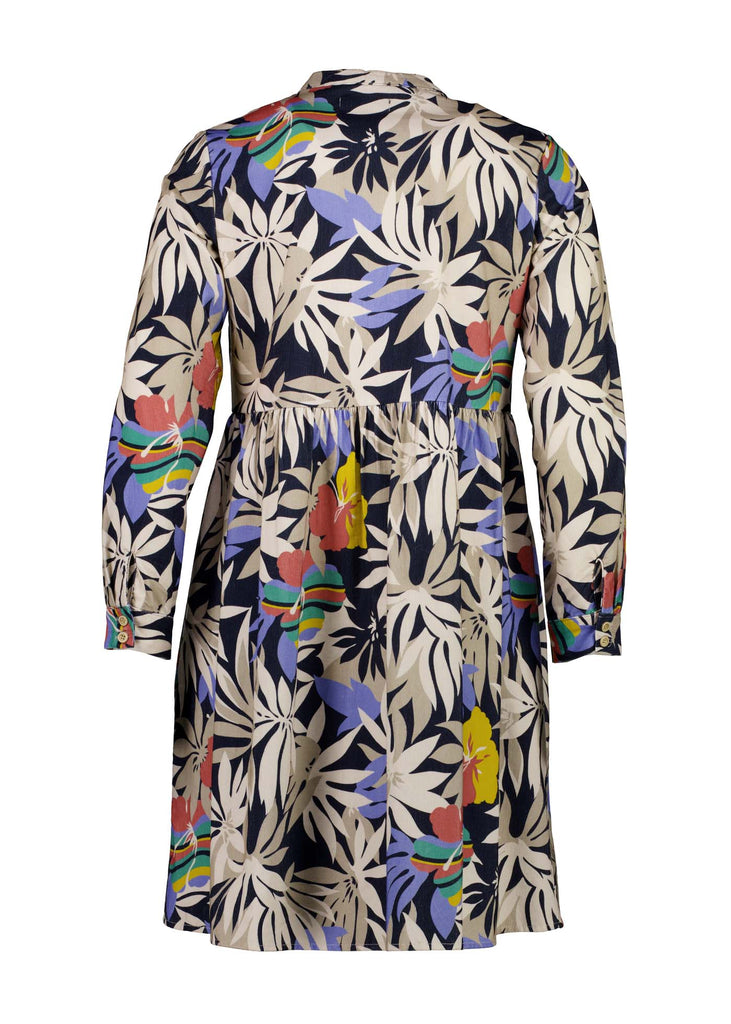 Olga de Polga tunic dress in Wildflowers printed cotton corduroy. Long sleeves with a cuff and a front button opening. Back