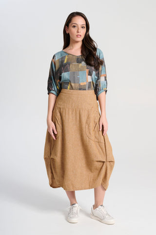 Olga de Polga Azure blue soft wash Camisa blouse in 100% Tencel. A reversible top with a soft v-neck on one side and a round neck on the other side. 
 Half sleeves, with a batwing shape. Front full  length view