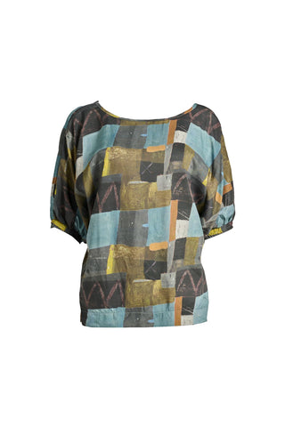 Olga de Polga Azure blue soft wash Camisa blouse in 100% Tencel. A reversible top with a soft v-neck on one side and a round neck on the other side. 
 Half sleeves, with a batwing shape. Front view