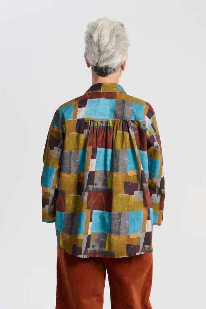 Olga de Polga classic cotton shirt in our AW25 Azure Kismet print from the Odyssey collection. The signature Olga Shirt is great for all occasions. It has an effortlessly chic, relaxed silhouette that drapes with ease. Back view on model