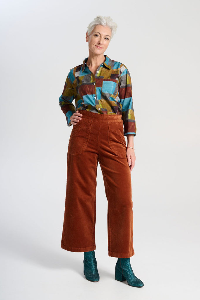 Olga de Polga classic cotton shirt in our AW25 Azure Kismet print from the Odyssey collection. The signature Olga Shirt is great for all occasions. It has an effortlessly chic, relaxed silhouette that drapes with ease. Full front view on model.