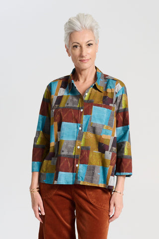 Olga de Polga classic cotton shirt in our AW25 Azure Kismet print from the Odyssey collection. The signature Olga Shirt is great for all occasions. It has an effortlessly chic, relaxed silhouette that drapes with ease. Front view on model.