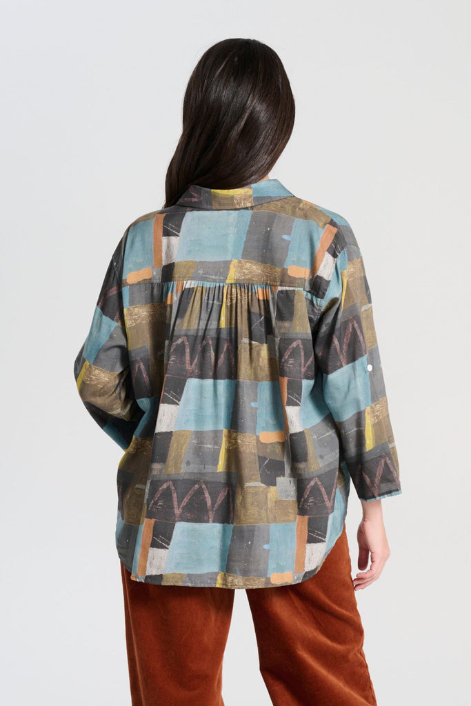 Olga de Polga classic shirt in Azure Kismet Soft wash printed Tencel.  Back view on model