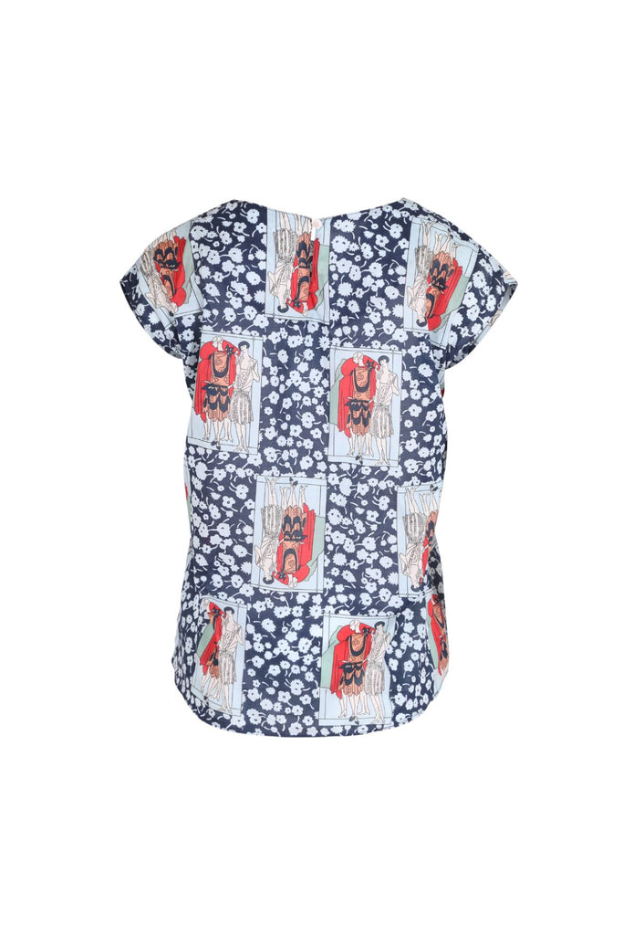 Felix tee in navy with splashes of red. Olga de Polga classic tee is a slim cut, fitted at the shoulders and waist, with cap sleeves and a round neck, and a button fastening at the back. Back view