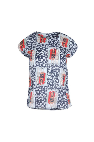 Felix tee in navy with splashes of red. Olga de Polga classic tee is a slim cut, fitted at the shoulders and waist, with cap sleeves and a round neck, and a button fastening at the back. front view