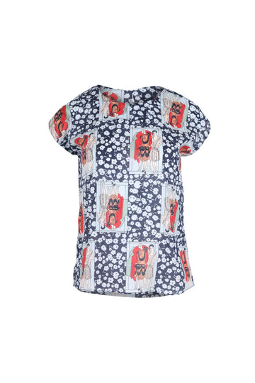 Felix tee in navy with splashes of red. Olga de Polga classic tee is a slim cut, fitted at the shoulders and waist, with cap sleeves and a round neck, and a button fastening at the back. front view
