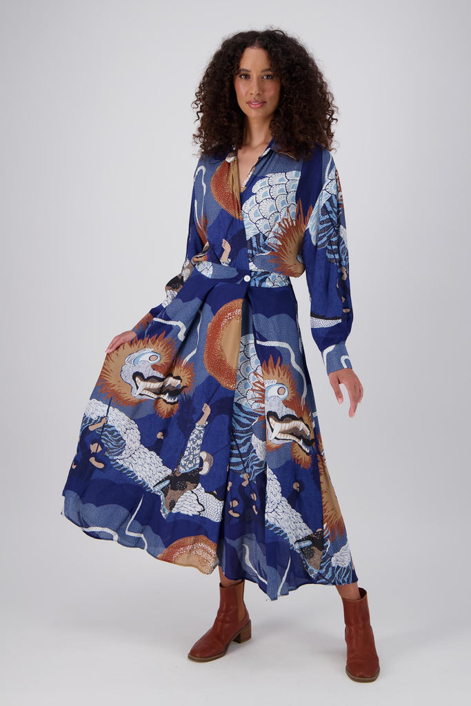 Olga de Polga Parisian dress in the new Festival Blue print. The Parisian Wrap Dress is a chic, versatile shirt dress, with an adjustable, elasticated waistband. front view