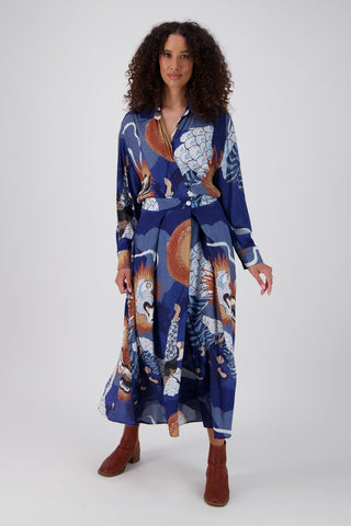 Olga de Polga Parisian dress in the new Festival Blue print. The Parisian Wrap Dress is a chic, versatile shirt dress, with an adjustable, elasticated waistband. Front view