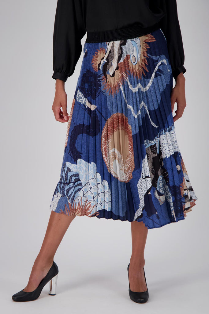 Olga de Polga best selling pleated skirt is back in a new Festival Blue print. Front