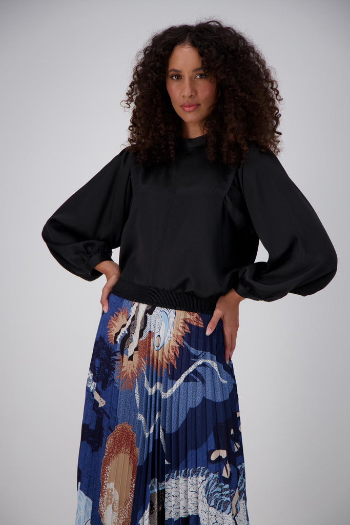 Olga de Polga best selling pleated skirt is back in a new Festival Blue print. Waistband cose-up.