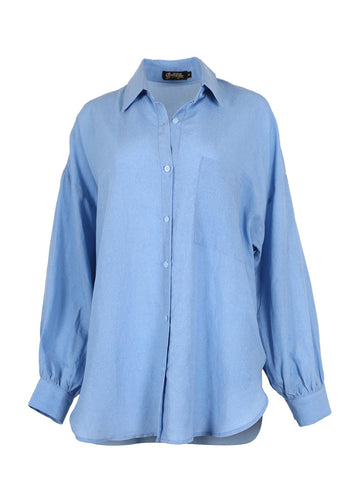 Olga de Polga Le Bon Shirt in Blue tencel and linen blend. Long sleeves with a collar and button front. This is an oversized shirt with a relaxed fit. Front view.