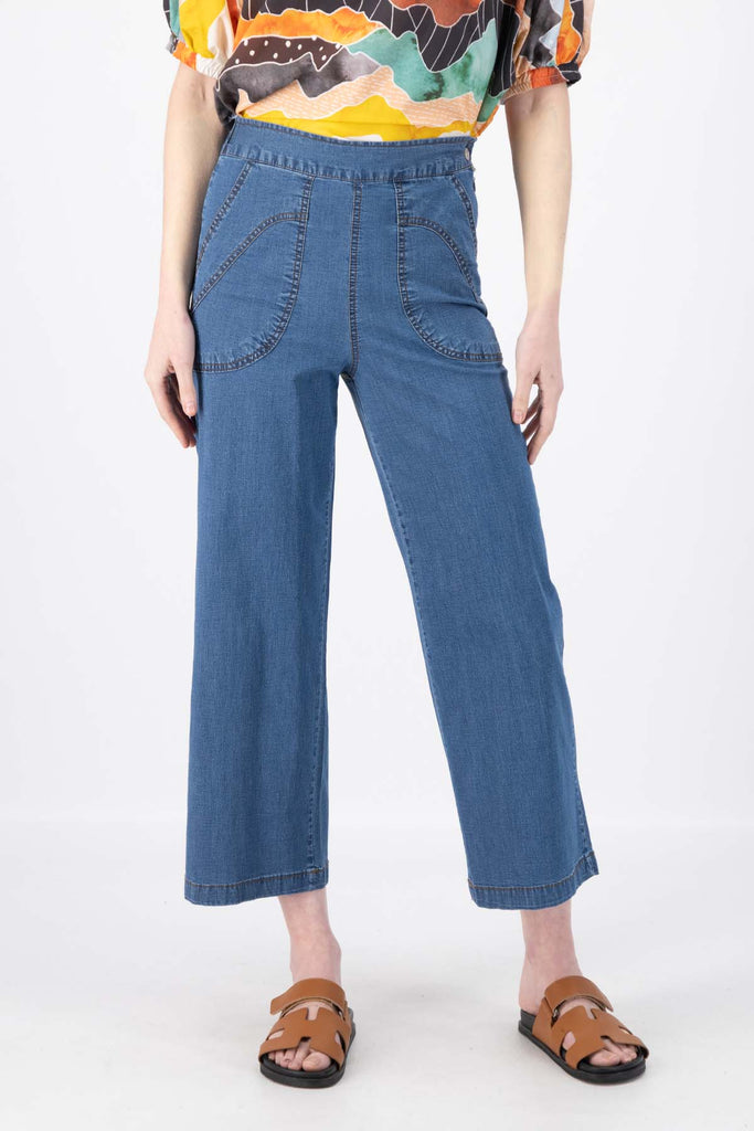 Olga de Polga Peggy Ligera Pants in summer lightweight denim. Light wash. Front view on model