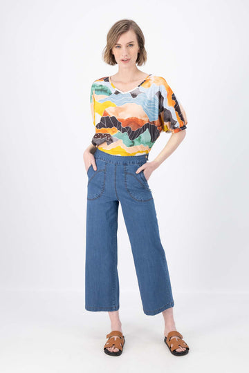 Olga de Polga Peggy Ligera Pants in summer lightweight denim. Light wash. Front full view on model