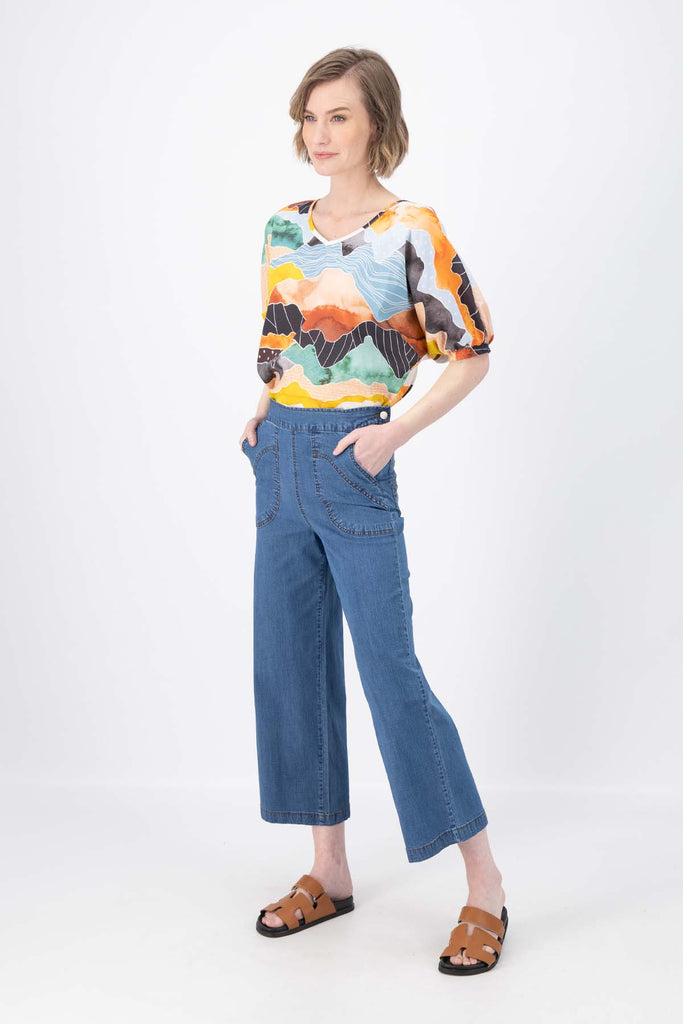 Olga de Polga Peggy Ligera Pants in summer lightweight denim. Light wash. Front side view on model