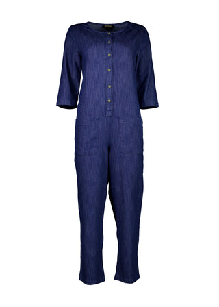 Olga de Polga Blue mid-wash denim Artisan Jumpsuit in cotton denim. Half sleeves and a button down front with patch pockets. Ankle length.  Front