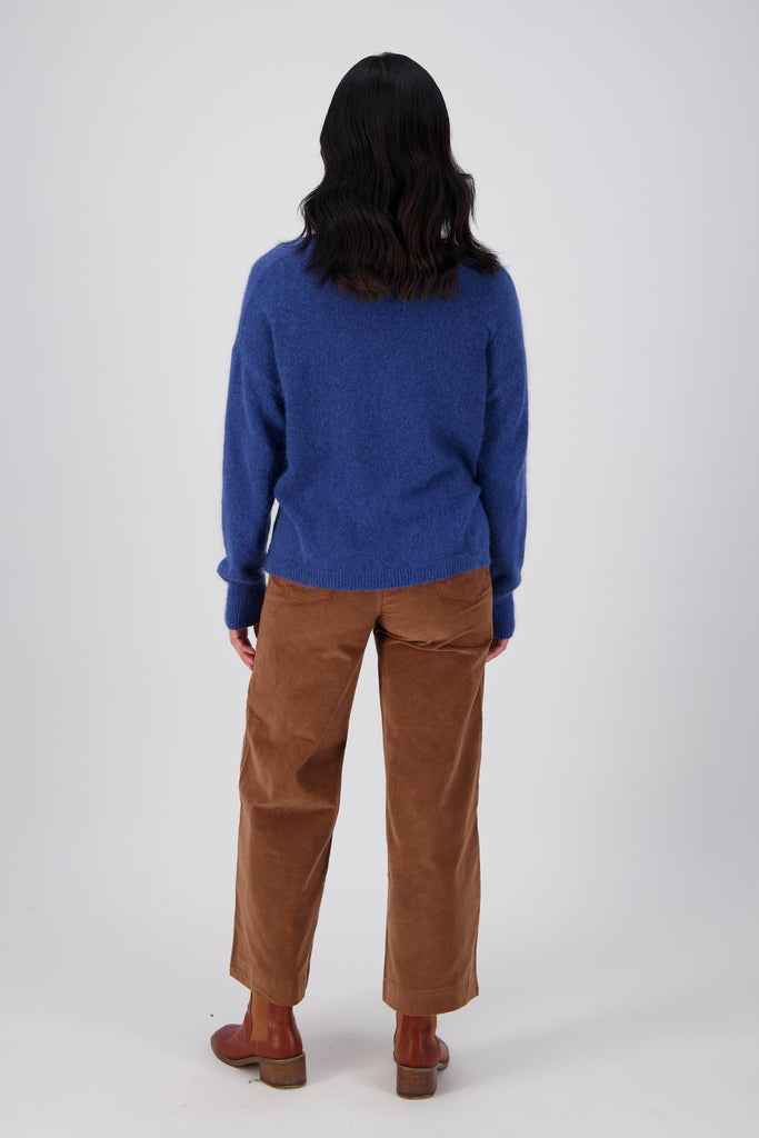 Olga de Polga Portland angora wool sweater in Cobalt Blue. Slightly cropped length with long sleeves, and a round neckline. Back full view