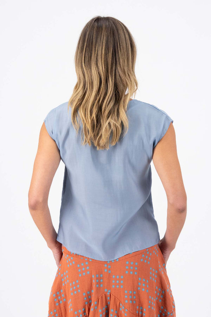 Olga de Polga Skyscraper tee in 100% Tencel. Round neck, cap sleeves. Finishes at the hip. Back view on model.