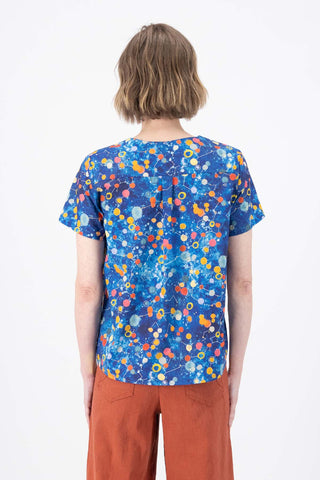 Olga de Polga classic top in the Spacio Blue Printed cotton. 100% Cotton. Round neck. Short sleeves. Boxy fit. Back view on model.