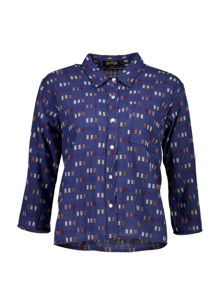 Olga de Polga classic shirt in the new Blue Telegraph woven cotton. With accents of red, yellow, cream and mauve. Front