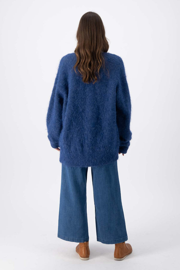 Olga de Polga navy alpaca long To the Moon and Back cardigan with a button front and extra long sleeves.  Full back view