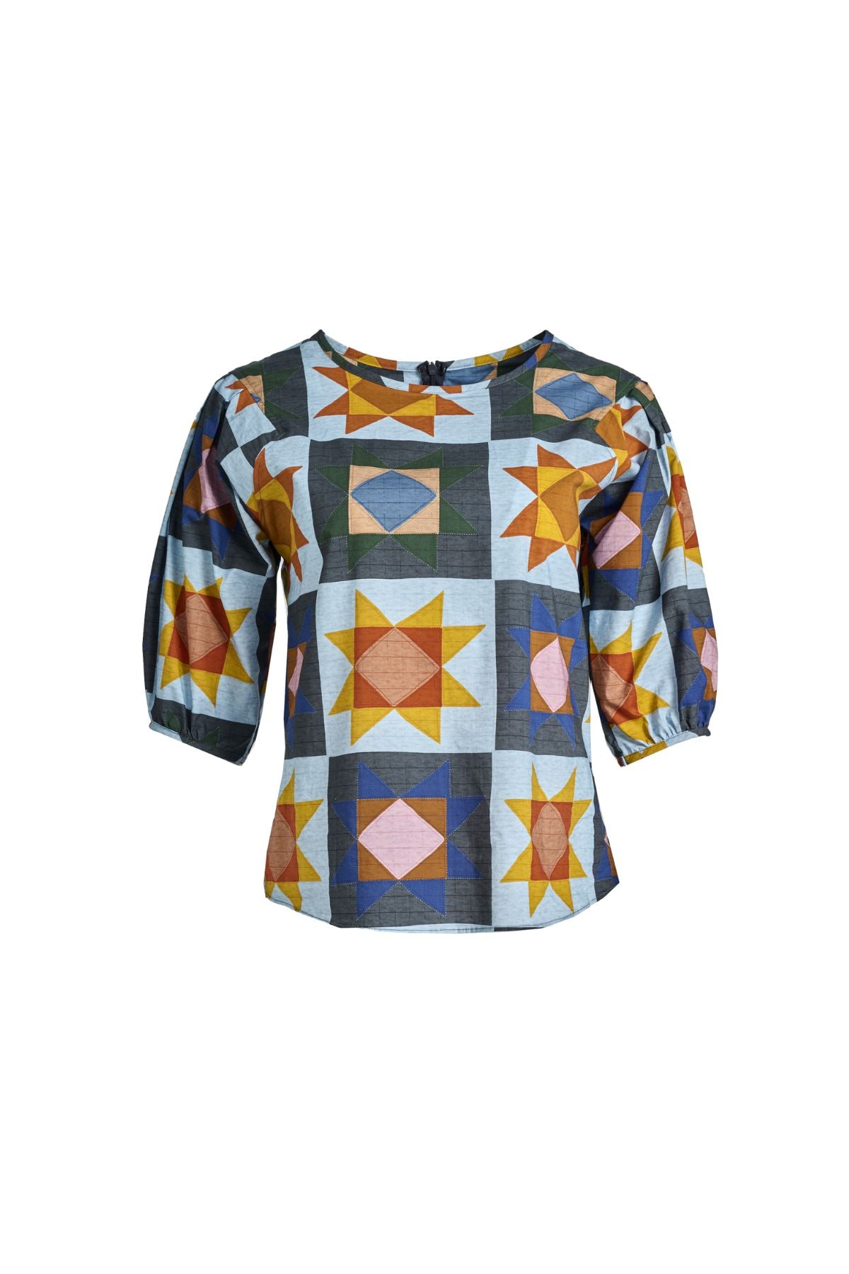 The blouse features a beautifully detailed lantern sleeve with a drop shoulder and delicate pleating on the shoulder and cuff. It also has a wide boat neckline and invisible zip fastening at the back. Front view