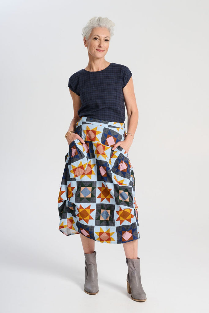 Olga de Polga printed Milwaukee skirt in the Veda Day print. Fine cotton cord. Comfy waistband making it the perfect throw-on-and-go!  Front view on model