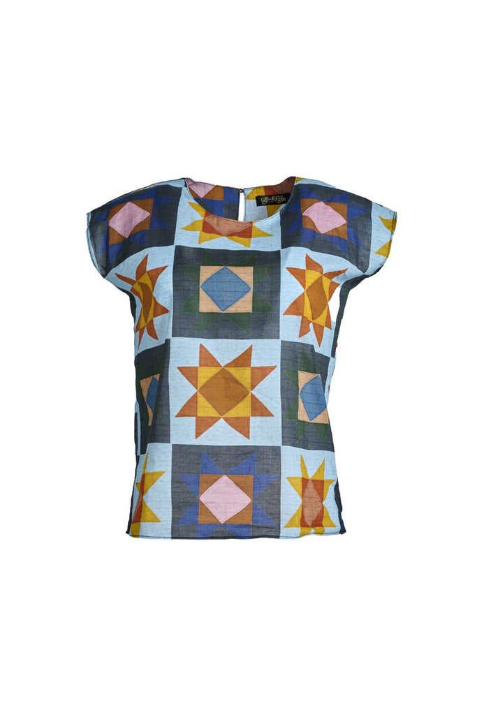 Olga de Polga classic cotton tee in the Veda Day print.  Straight cut with slight tapering to the waist.
Cap sleeves.
Round neckline. Front view
