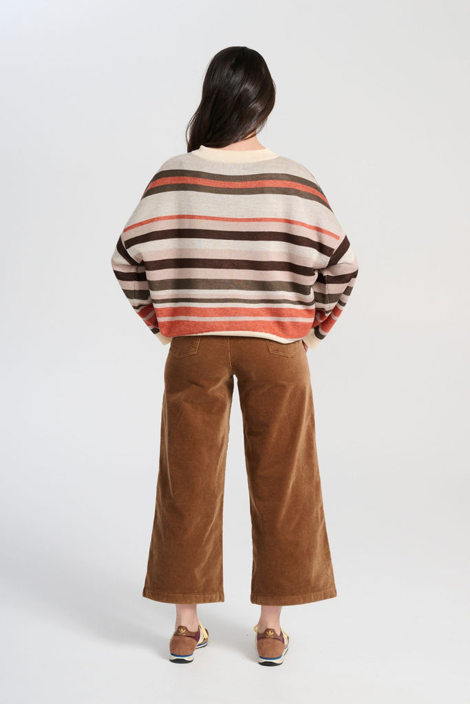 Olga de Polga brown Peggy Paris Pants Cafe in soft velvet. Original cropped length with large front patch pockets.  Back view on model.