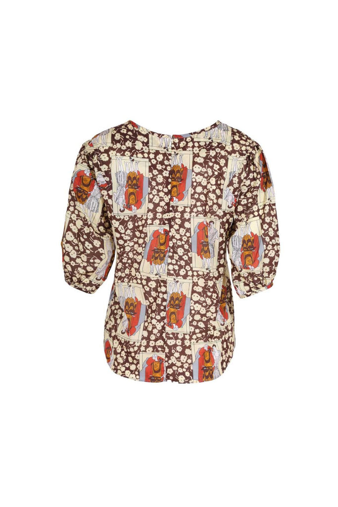 Olga de Polga brown printed blouse in the Felix Chocolate print.  Wide round neckline, lantern sleeves, tapered in at the waist. Finishes at the hip. Back