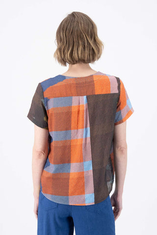 Olga de Polga Top in Brown Uber Jada Printed cotton. Classic top with short sleeves and a round neckline. Boxy shape. Finishes at the hip. Back view on model.