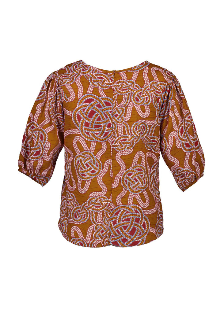 Olga de Polga seersucker blouse in the Love knots print with deep caramel brown and accents of blue and red. Back view